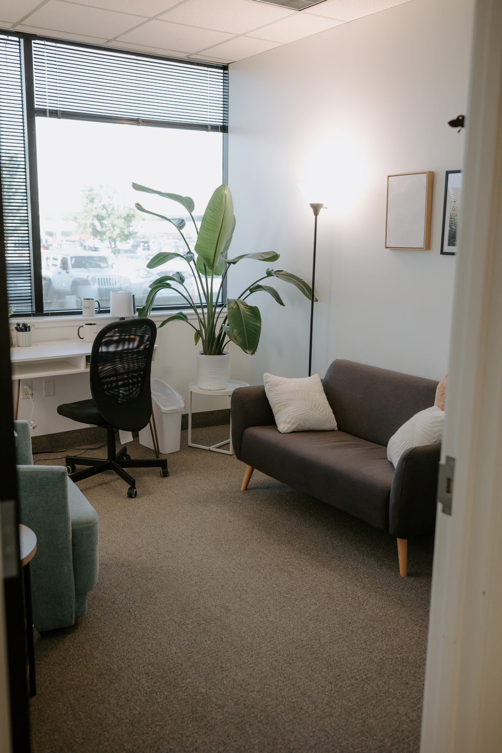 Photo of a therapy office with a couch.